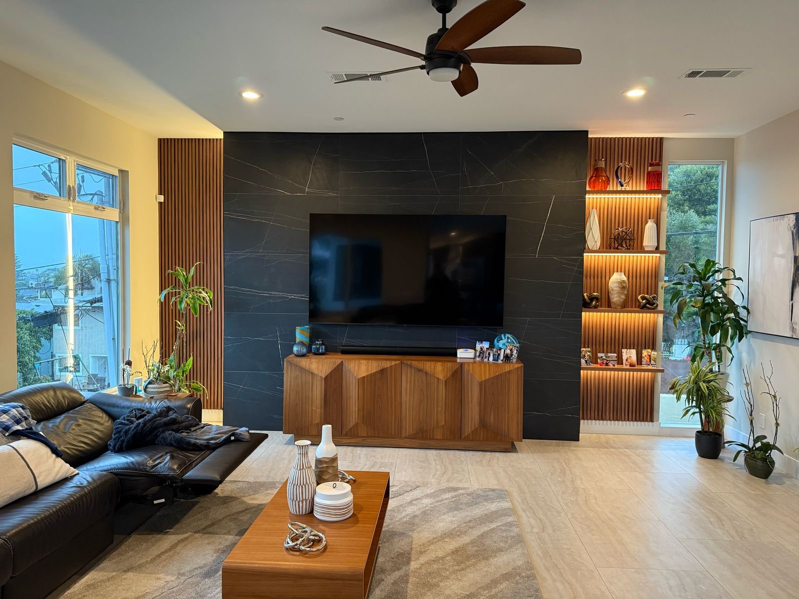 After living room accent wall renovation by Statera Design & Build